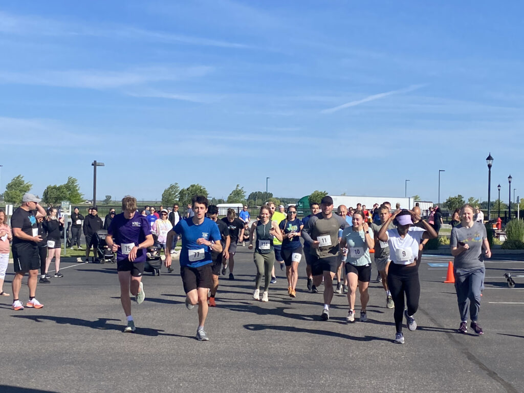 Melaleuca employees at the start of the Melaleuca fun run event